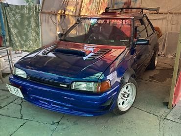 street: Mazda 323: 1991 г., 1.6 л, Механика, Бензин, Хэтчбэк — 8