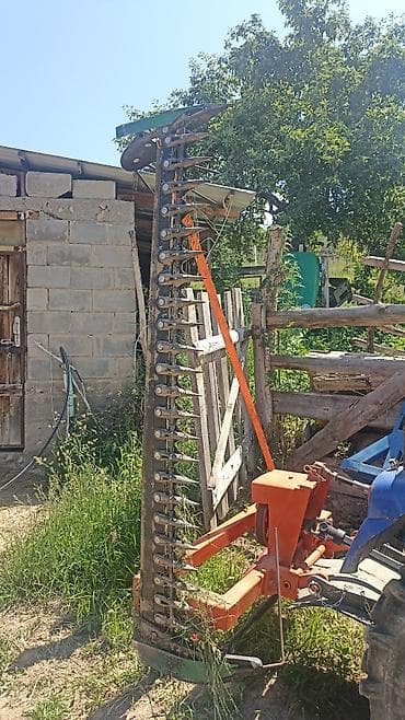 кытай мото: Синий трактор марки Lovol, оснащенный передним навесным оборудованием — 4