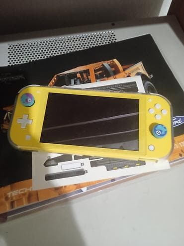 Nintendo Switch Lite прошитая, есть две части зельды, Марио карт, и