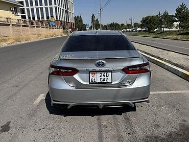 тайота из: Toyota Camry: 2021 г., 2.5 л, Автомат, Гибрид, Седан — 5