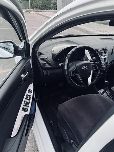 киа саларис: Hyundai Solaris: 2015 г., 1.4 л, Автомат, Бензин, Седан — 10