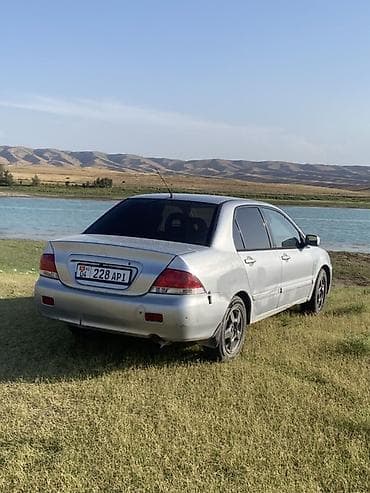 600 кубовый мотоцикл: Mitsubishi Lancer: 2005 г., 1.6 л, Механика, Бензин, Седан — 5