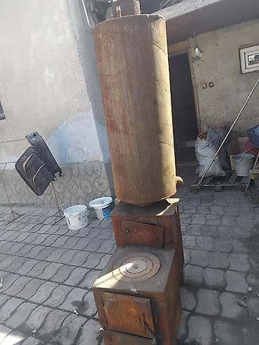 угольный печь: Печь-буржуйка с варочной поверхностью и теплоаккумулятором/водогрейным — 1