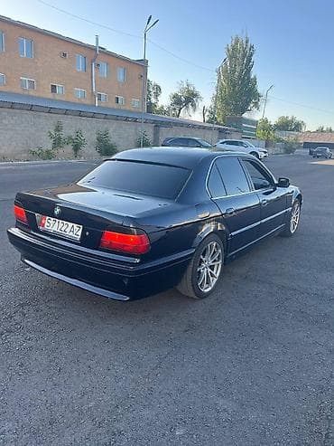 куда: BMW 740: 1996 г. — 5