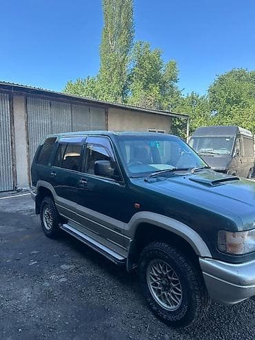 айни 95: Isuzu Bighorn: 1995 г., 3.1 л, Автомат, Дизель, Внедорожник — 2