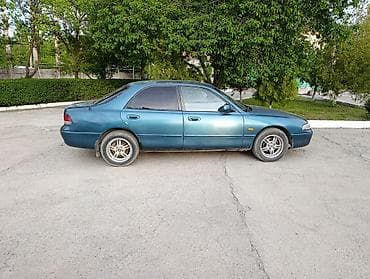 Mazda 626: 1992 г., 1.8 л, Механика, Бензин, Седан