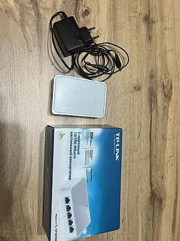 TP-Link TL-SF1005D — 5‑портовый настольный коммутатор Fast Ethernet