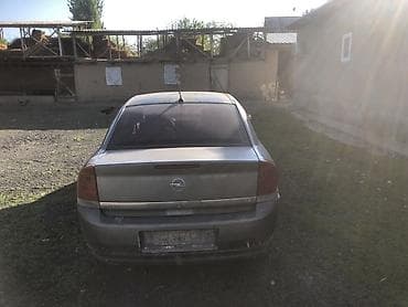 салон на гольф 2: Opel Vectra C седан, серый цвет, дорестайлинг. Автомобиль после — 4