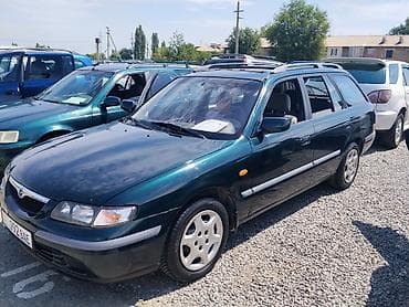 Mazda 626: 1999 г., 1.8 л, Механика, Бензин, Универсал
