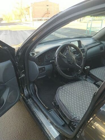 витз авто: Nissan Almera: 2005 г., 1.5 л, Вариатор, Бензин, Хэтчбэк — 9