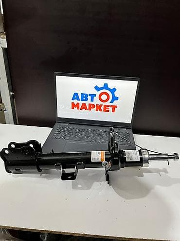 mazda: Передний амортизатор Mazda 2007 г., Новый — 1