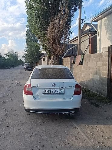 skoda fabia: Skoda Rapid: 2015 г., 1.6 л, Механика, Бензин, Седан — 2