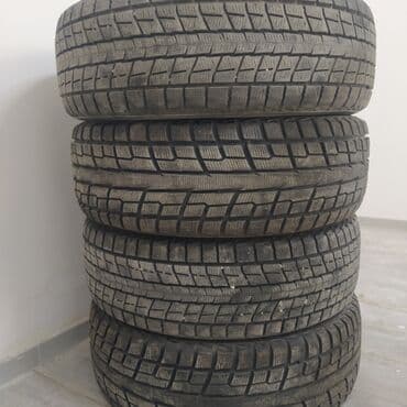 покрышка на трактор: Шины 235 / 55 / R 20, Зима, Комплект, Внедорожные (АТ/МТ), Япония, Dunlop — 6