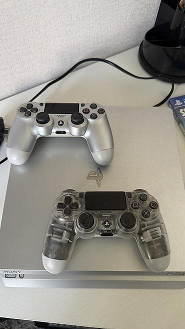 Sony PlayStation 4 Slim (серебристая) Комплектация: - Консоль PS4