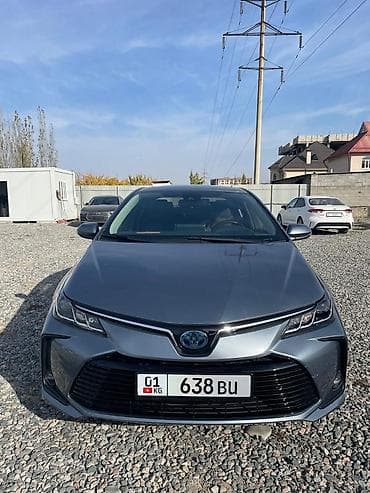 byd e3: Toyota Corolla: 2021 г., 1.8 л, Вариатор, Гибрид, Седан — 1