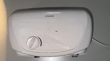 температуры: Проточный электрический водонагреватель Atmor Classic 501, 3.5 kW — 1