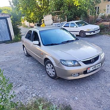 бутка бу: Mazda Familia: 2002 г., 1.6 л, Автомат, Бензин, Седан — 5