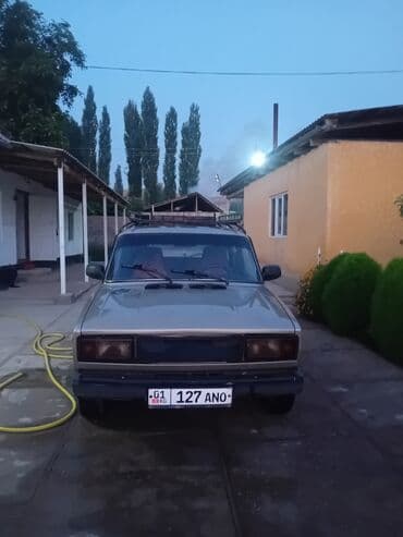 опель вектра а: Универсал Lada 2104 бежевого цвета, оснащенный багажником на крыше — 1