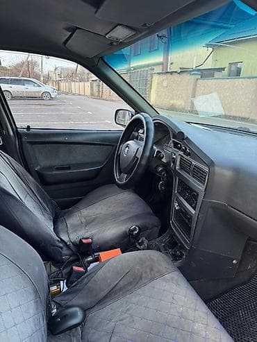 2011: Daewoo Nexia: 2011 г., Механика, Седан — 4