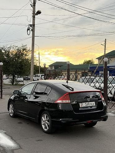 Honda Insight: 2010 г., 1.3 л, Вариатор, Гибрид, Фастбек — 7