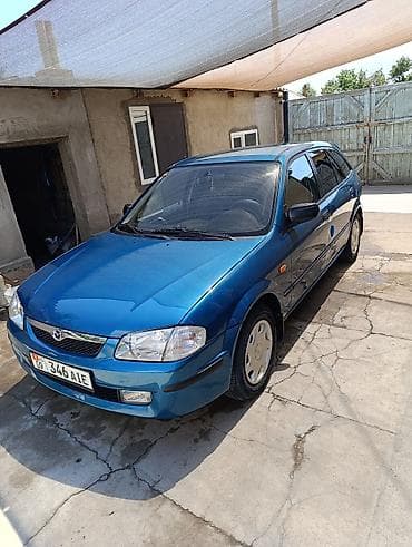 каропка на мазда: Mazda 323: 1999 г., 1.5 л, Автомат, Бензин, Универсал — 3
