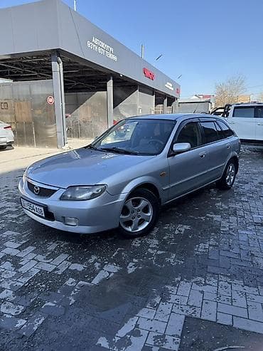 w210 e280: Mazda 323: 2003 г., 1.6 л, Механика, Бензин, Универсал — 1