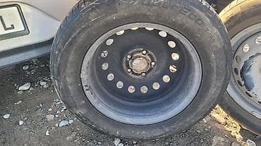 g2 master: Комплект автомобильных шин Bridgestone Turanza T005 размером 215/65 — 4