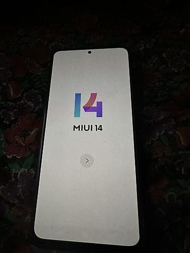 Смартфон Redmi с оболочкой MIUI 14 Характеристики и особенности: -