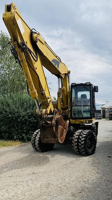 ef m: Экскаватор, Caterpillar, Колесный — 2