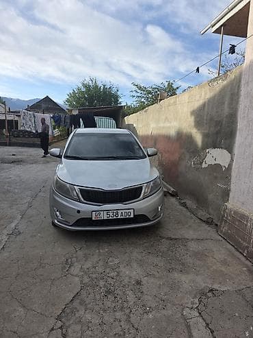 passat passat: Kia Rio: 2013 г., 1.6 л, Механика, Бензин, Седан — 2