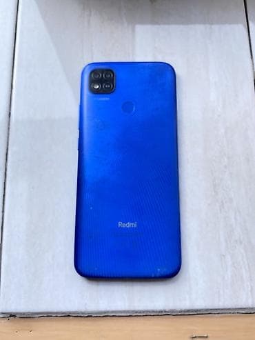Смартфон Redmi (синего цвета) - Корпус: матовая текстурированная