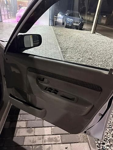 tesla model 3: Mazda Demio: 1999 г., 1.3 л, Автомат, Бензин, Хэтчбэк — 6