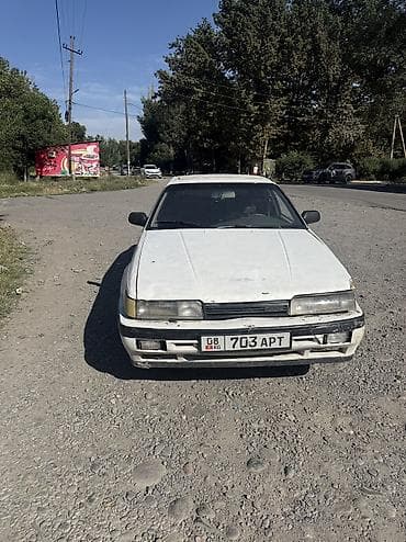 Унаа: Mazda 626: 1991 г., 2.2 л, Кол менен иштөөчү, Бензин, Хетчбек — 2