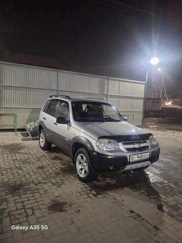 шины на нивы: Chevrolet Нива: 2003 г., 1.7 л, Механика, Бензиновая, Внедорожник — 3