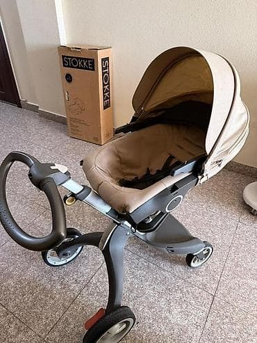 Детская коляска Stokke Xplory с прогулочным блоком и коробкой от