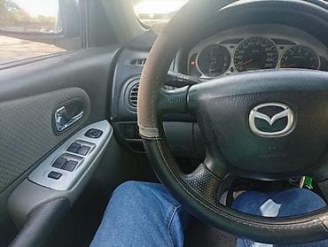 mazda demio 2004: Mazda 323: 2002 г., Механика, Хэтчбэк — 1