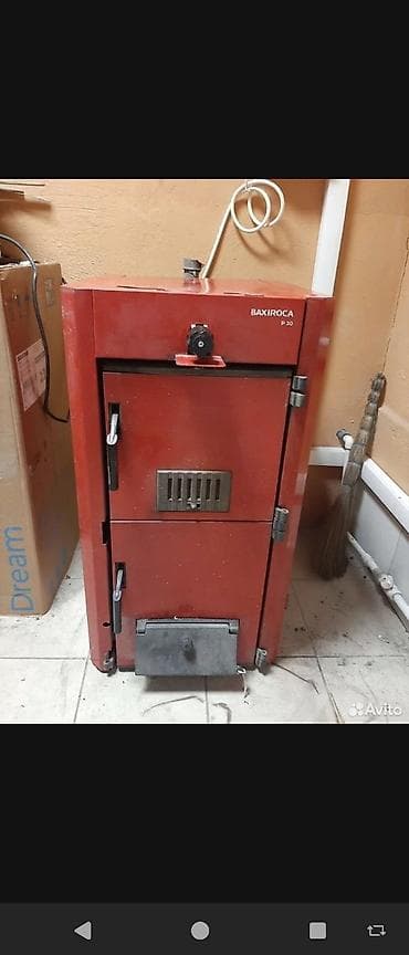 испания: Твердотопливный котёл ROCA P-30. Тип котла - напольный. Вид топлива — 3