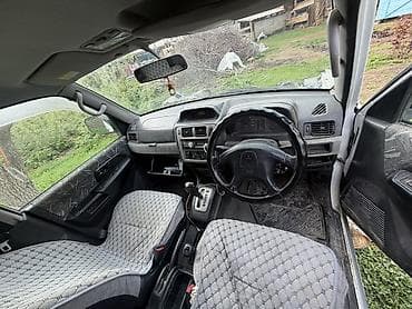 маз водовоз: Mitsubishi Pajero iO: 1998 г., Внедорожник — 5