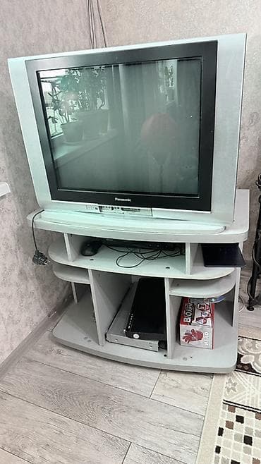 Техника и электроника: Телевизор Panasonic (ЭЛТ) с телевизионной тумбой.
Работает — 1