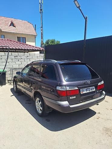 глушитель выхлоп: Mazda 626: 1999 г., 1.8 л, Механика, Бензин, Универсал — 3