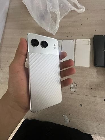 тилифо: OnePlus Nord 4, Б/у, 256 ГБ, цвет - Серебристый, 2 SIM — 3