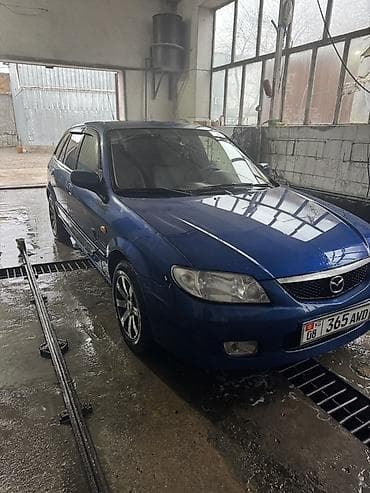 глушитель спортивный: Mazda 323: 2000 г., Хэтчбэк — 1