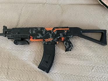 Игрушечный бластер T2X (стилизованный под штурмовой автомат) - Тип