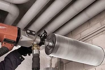 Алмазное бурение отверстий в бетоне, железобетоне, кирпиче и камне. -