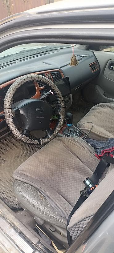 step 2: Nissan : 2001 г., 2 л, Вариатор, Бензин, Хэтчбэк — 7