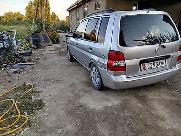 byd e2 2022: Mazda Demio: 2002 г., Механика, Бензин, Универсал — 7