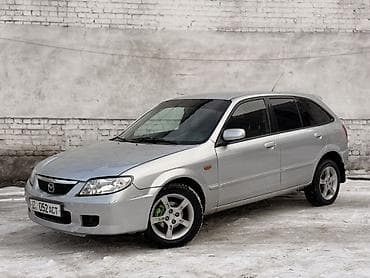 Mazda 323: 2003 г., 1.6 л, Механика, Бензин, Универсал
