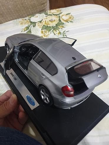 ra 1: Коллекционная масштабная модель BMW 120i (Welly). Зеркала дверные — 4