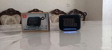 microlab solo: Портативная Bluetooth‑колонка Sony SRS‑XB10 0(оранжевый) помещается — 4