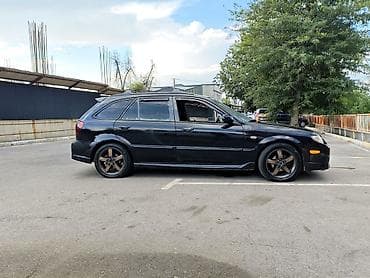 gilera runner: Mazda 323: 2002 г., 1.6 л, Автомат, Бензин, Хэтчбэк — 2